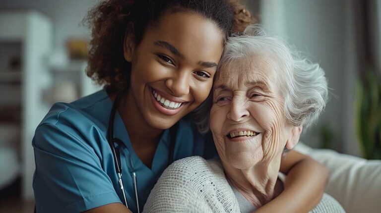 Older adult arranging family photos and personal belongings in a bright assisted living room.